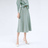 Korean version of women's casual age-reducing solid color skirt summer medium and long splicing large skirt pleated skirt