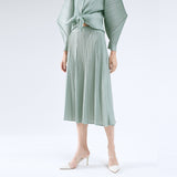 Korean version of women's casual age-reducing solid color skirt summer medium and long splicing large skirt pleated skirt
