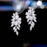 2025 S925 silver needle niche design  light luxury fashion earrings, high-end super flash rhombus zircon tree leaf earrings