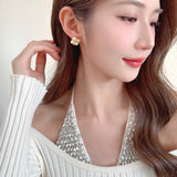 2025 S925 silver needle niche design earrings woven rope knot advanced sense small exquisite versatile simple pearl stud earrings