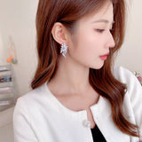 2025 S925 silver needle niche design  light luxury fashion earrings, high-end super flash rhombus zircon tree leaf earrings