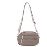 2025 Cross-border Korean version of the new girl's mobile phone breast bag, simple pu messenger bag, trendy fashion zipper women's shoulder small round bag