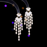 2025 Long modified face shape shows face thin earrings temperament high sense fashion elegant temperament bright zircon fringed earrings