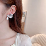 2025 popular New Temperament Niche Retro Earrings Metal Hollow Zircon Butterfly Earrings Premium Pearl Earrings